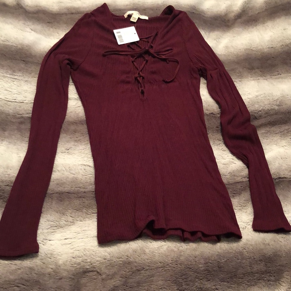 Urban Outfitters. Long sleeve, tie up